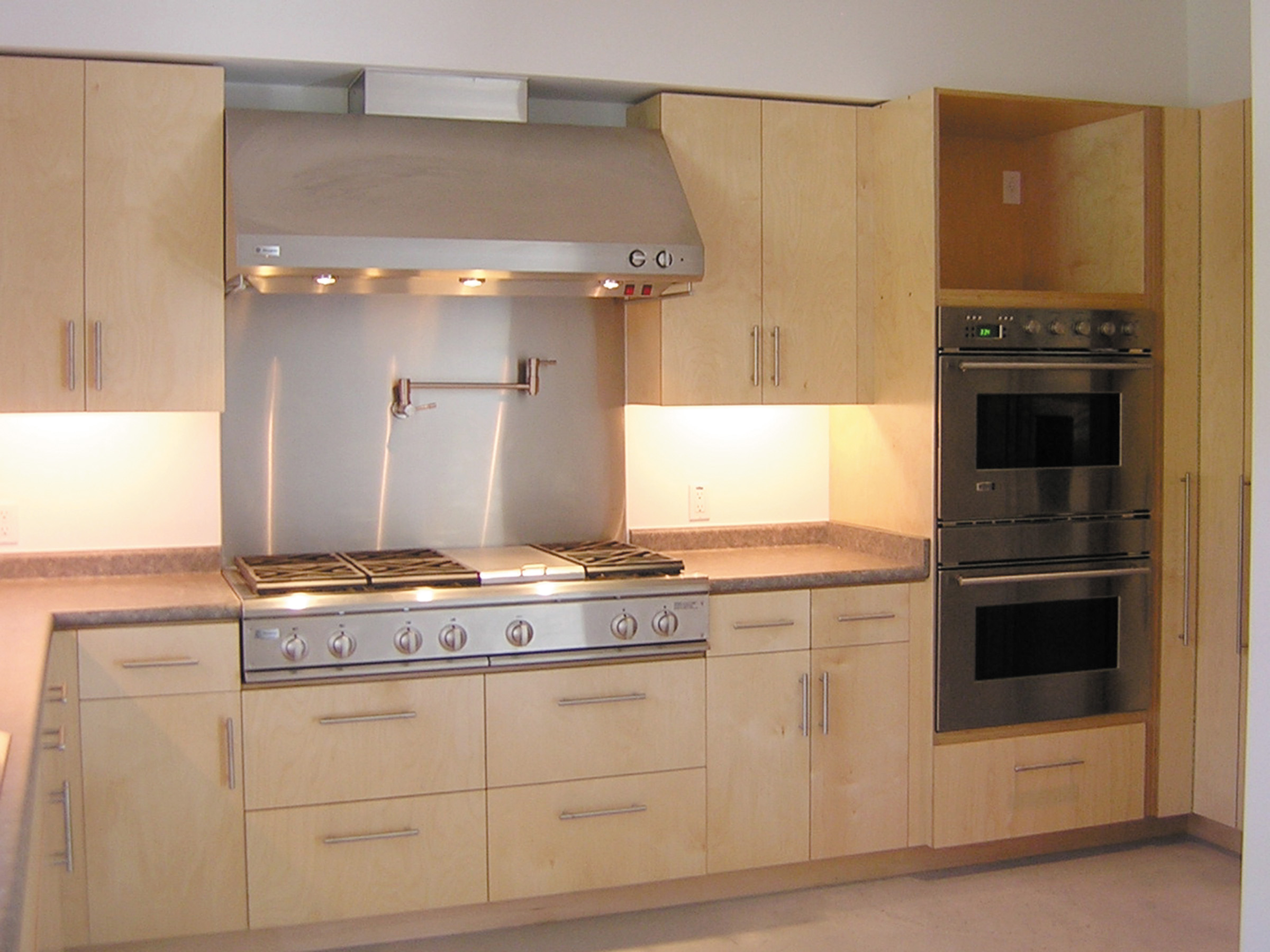 Contemporary kitchen built with natural baltic birch.