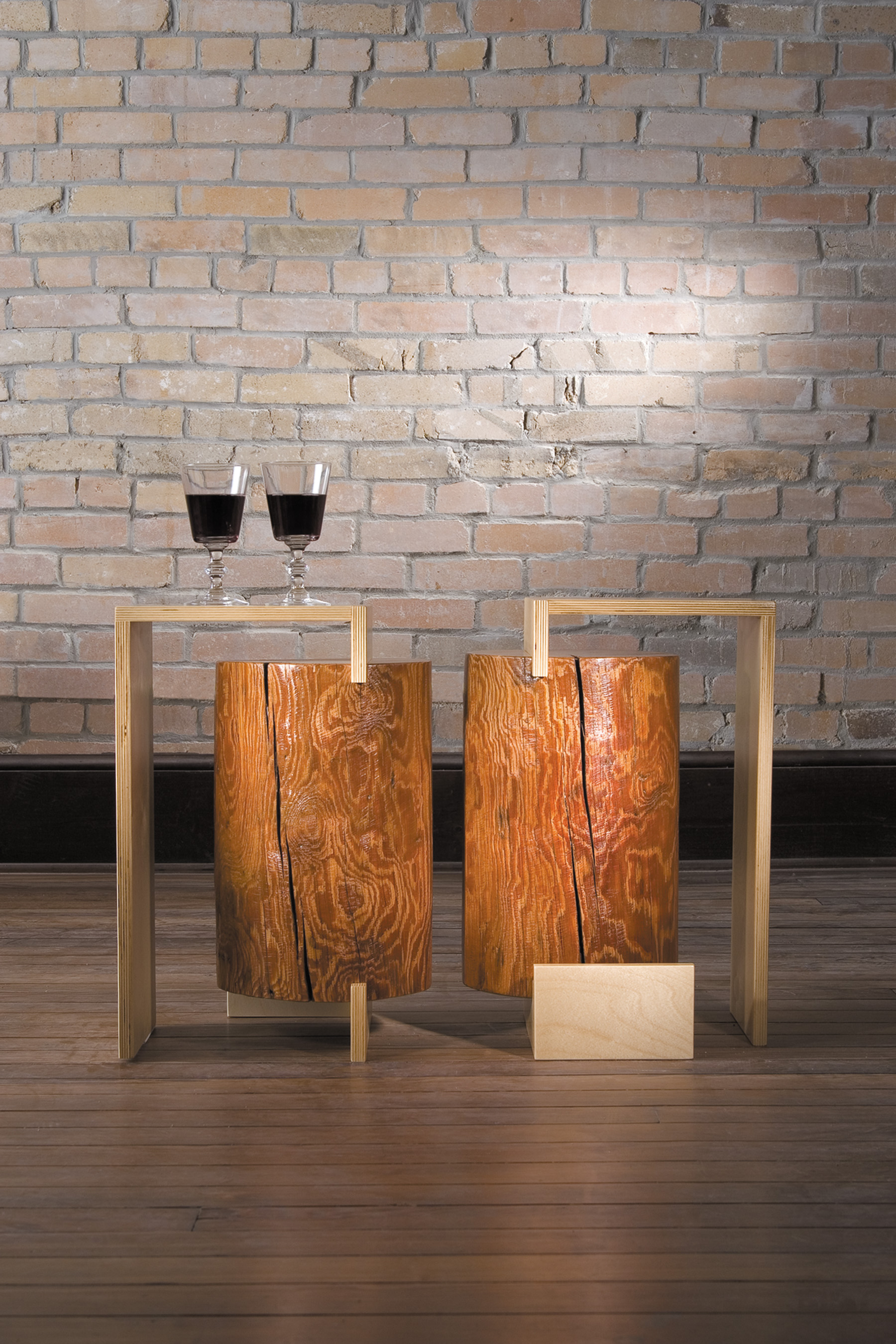 Contemporary accent tables built with baltic birch and southern yellow pine. The balic birch collides into the irregular but natural yellow pine. The baltic birch and the yellow pine are natural with a clear protective finish. These tables are part of The Umasi Collection by Ironwood Industries.